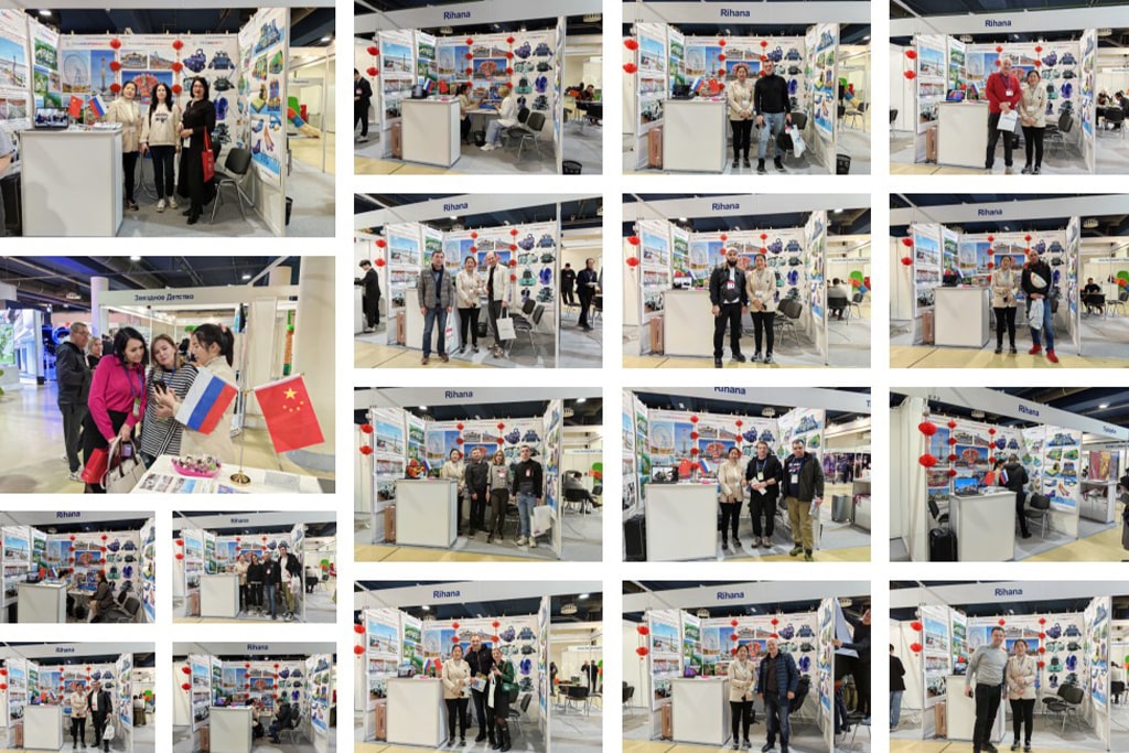 Hooplo Rides team with clients at RAAPA EXPO 2024 booth in Moscow, discussing amusement park solutions.