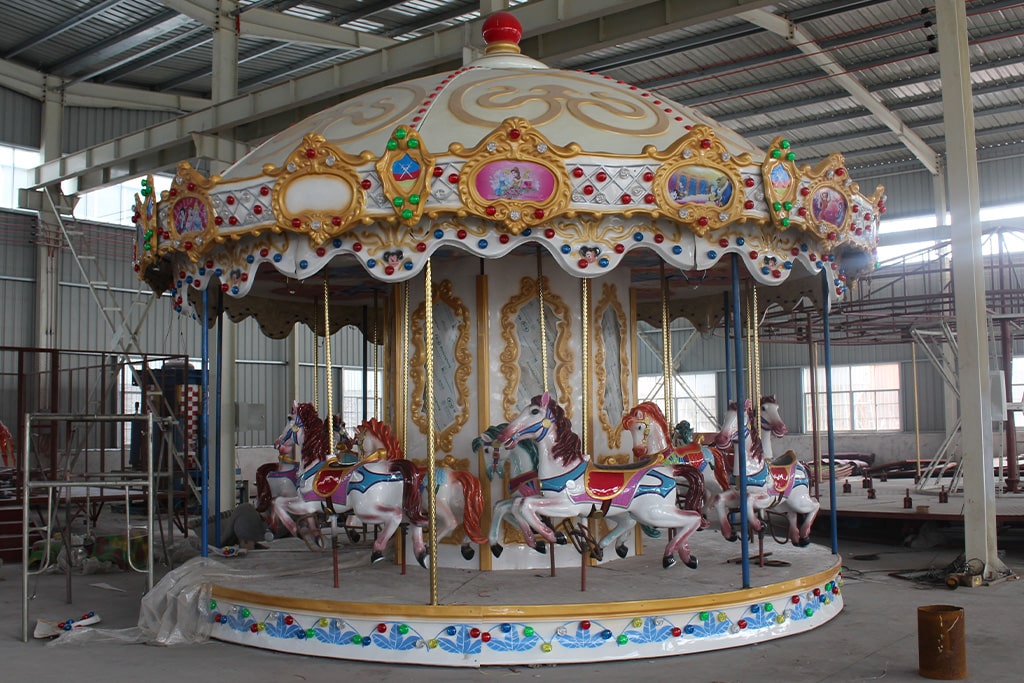 Newly manufactured 24 seat carousel ride in factory workshop, full size carousel horse for sale