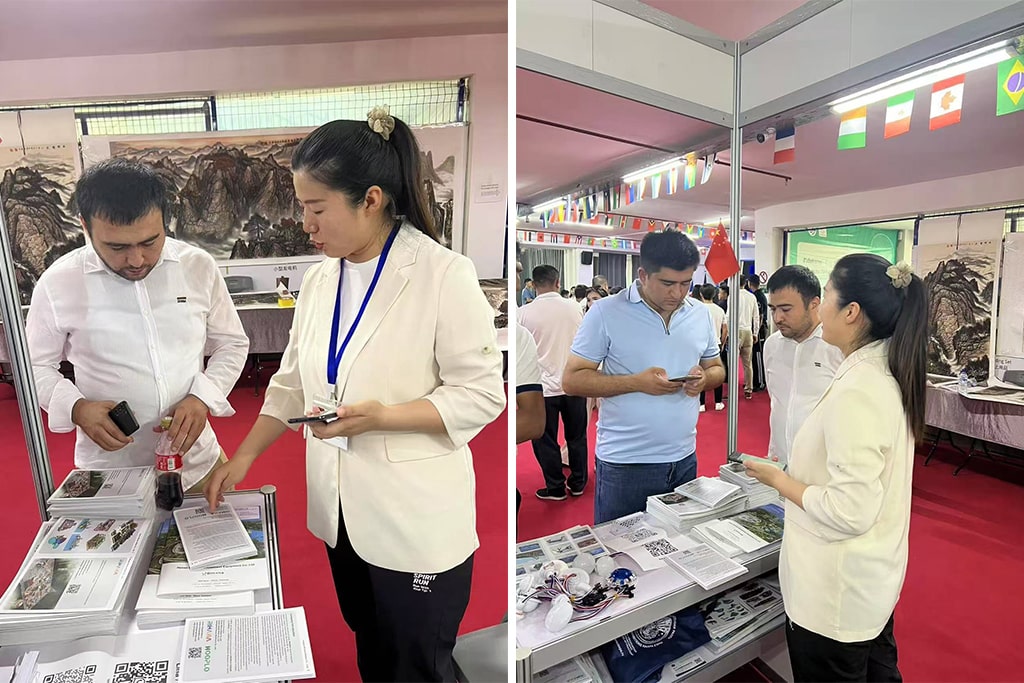 Customer inquiring about different kinds of rides in amusement parks during the 2025 Uzbekistan fair