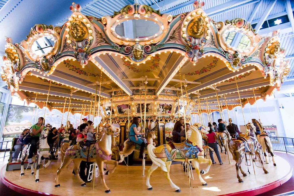 Full size carousel horse for sale with hand-painted details and porcelain-style finish