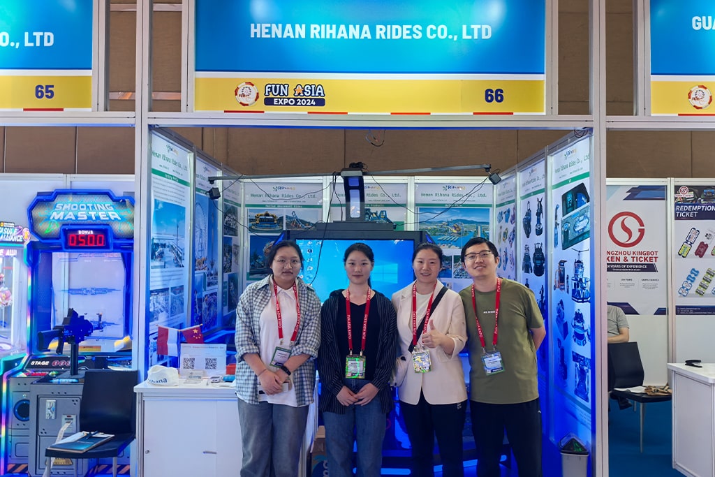 HOOPLO RIDES team in front of our booth at FUN ASIA EXPO 2024 in Jakarta, Indonesia