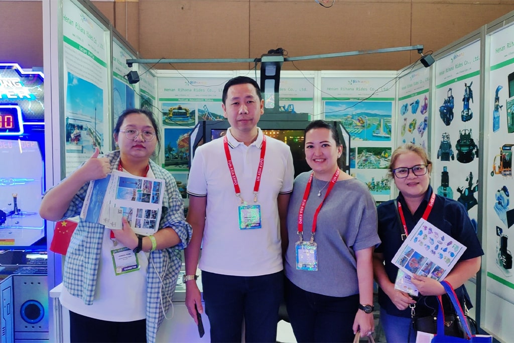 Photo with local amusement park procurement manager after discussing ride solutions