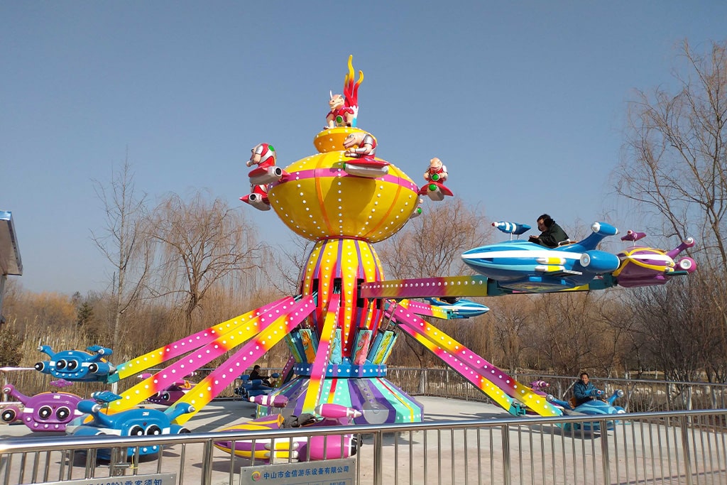Airplane Amusement Ride running in theme park