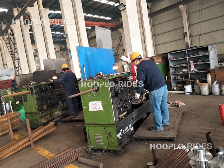 CNC cutting workshop for amusement ride production with precision steel processing for Sky Flyer and other rides