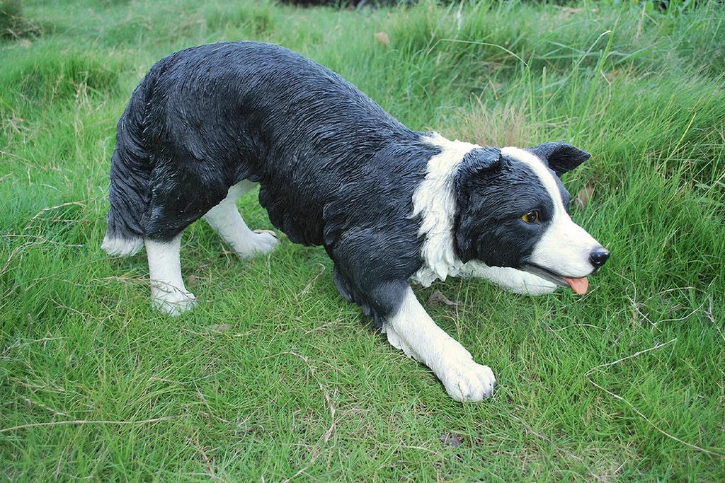 Fiberglass dog statue used to illustrate how much does a statue cost