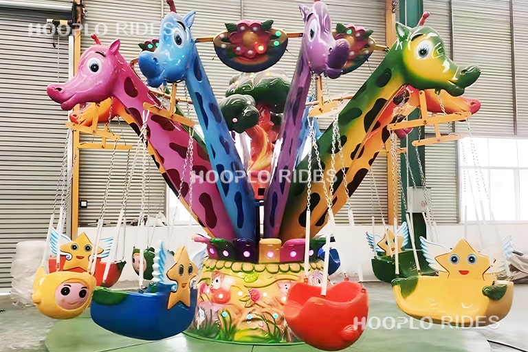 Mini swing carousel ride with giraffe design for children