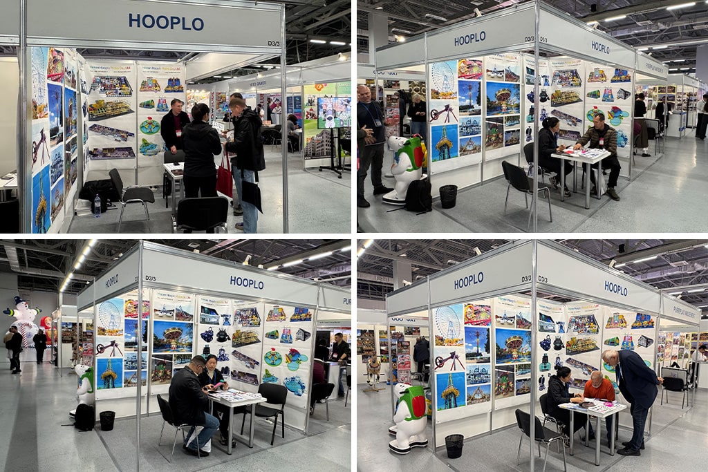 Visitors and partners taking photos with Hooplo Rides team at RAAPA EXPO Autumn 2025