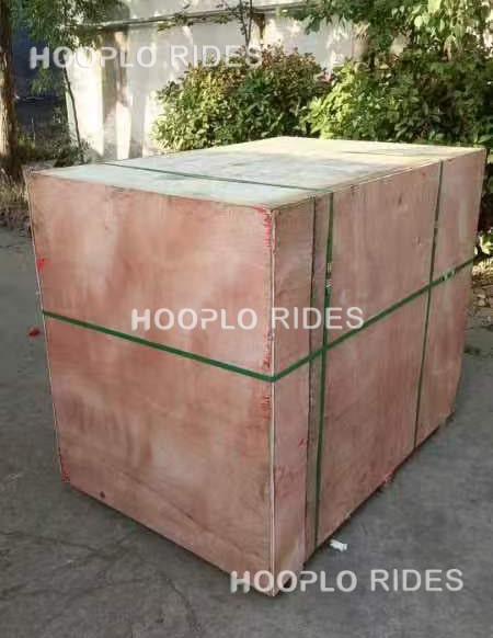 Kids excavator ride packed in a wooden crate, ready for shipment to Russia
