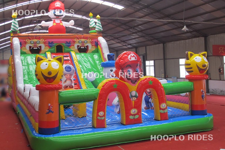 Right view of a mario style inflatable slide, suitable for outdoor and indoor inflatable playgrounds