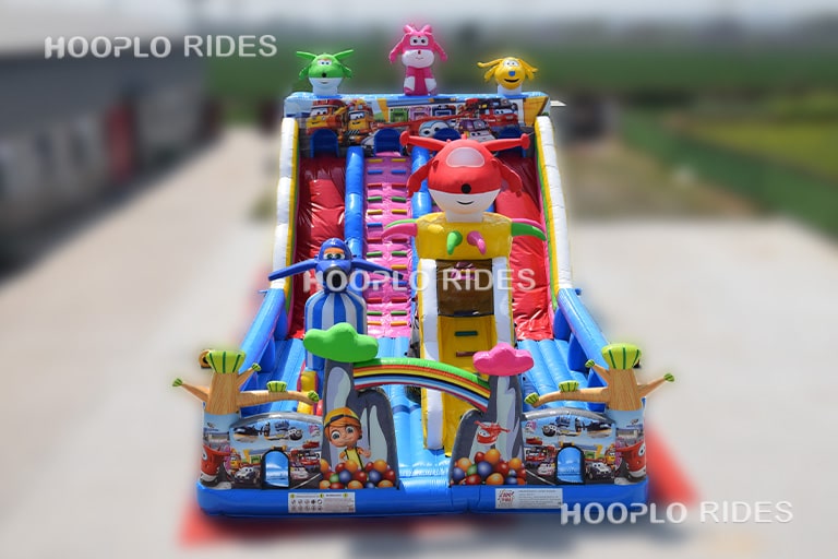 Front view of Peter Pan inflatable slide with themed entrance and climbing area for kids inflatable playgrounds