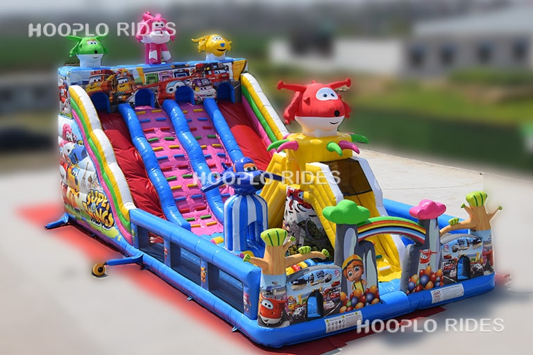 Peter Pan themed inflatable slide shown from the right angle, designed for children amusement parks and event rentals