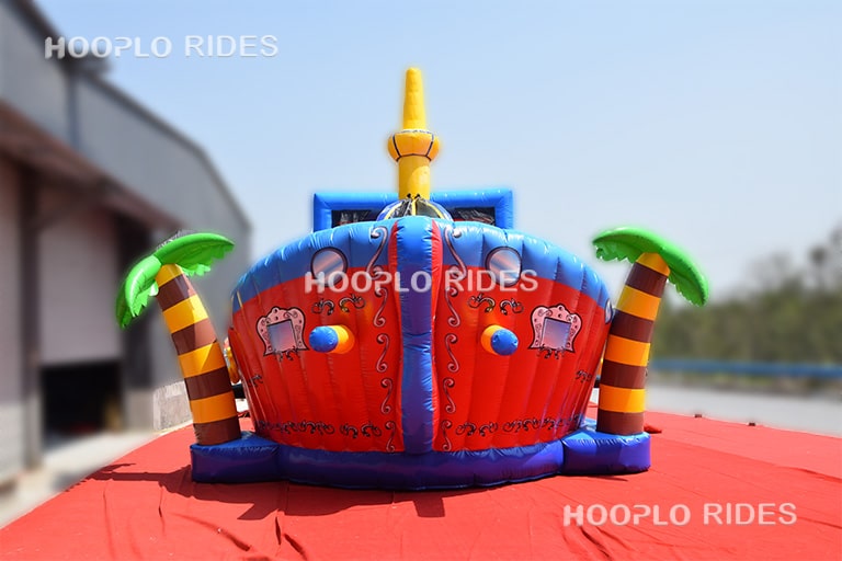 Back view of pirate ship inflatable castle highlighting entrance and internal play area