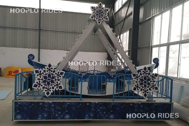 8 seat mini pirate ship ride mobile type during factory testing, showing safe operation and compact design