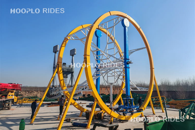 Right side view of Human Gyroscope Ride in factory testing phase