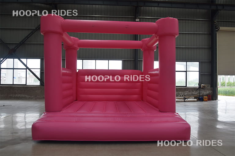 Front view of pink wedding inflatable bounce house with elegant wedding theme design