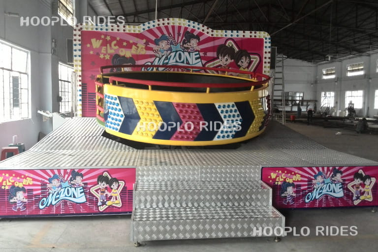16 seat Medium Disco Tagada Ride assembled in the factory and ready for testing, spinning amusement ride prepared before delivery