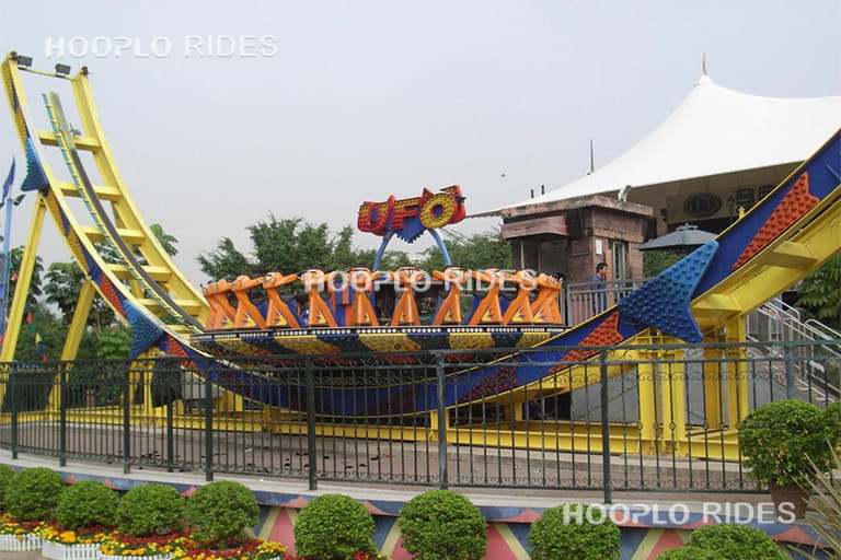 24 seats Disk'O ride platform and wavy track structure installed in an amusement park before operation.