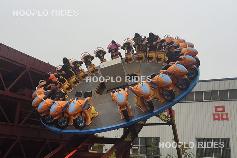 Disk'O amusement ride running during factory testing to ensure safety and performance before delivery.
