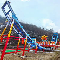 Disk’O ride spinning disk attraction operating in an amusement park