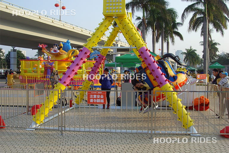 6-seat mini pendulum ride installed in a small outdoor amusement setup beside the road, compact amusement pendulum ride for small venues