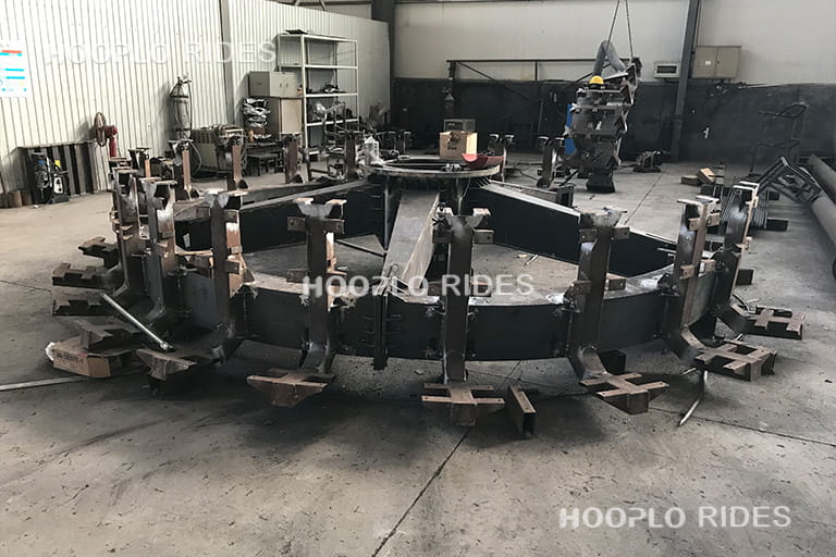 Welded seat frame structure of a pendulum ride after steel fabrication in the factory workshop