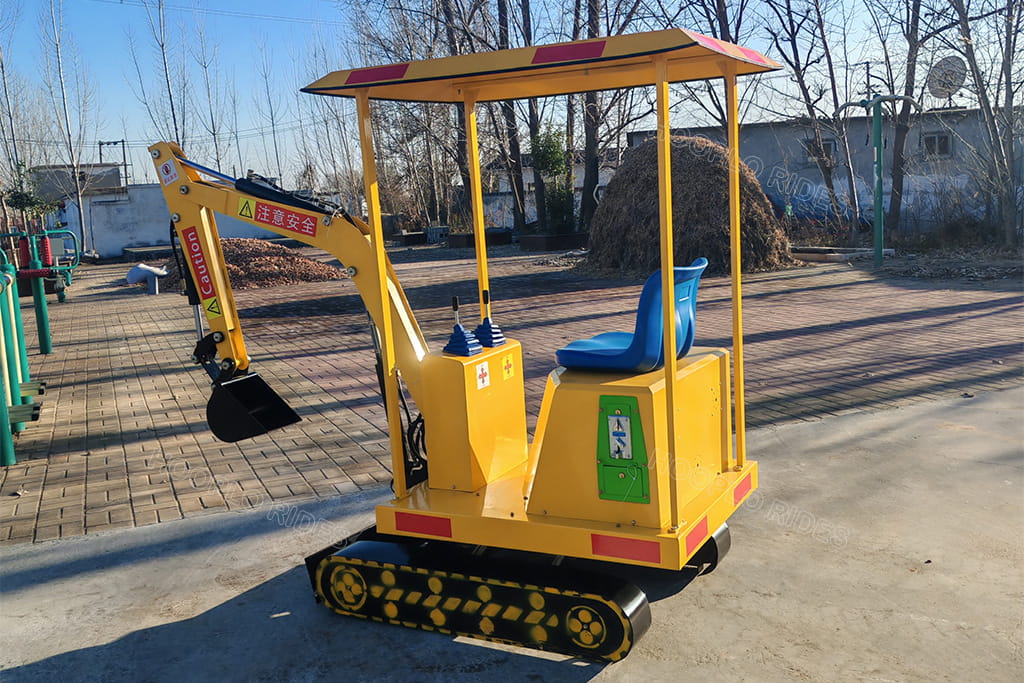 Side view of a yellow Kids Excavator Ride for amusement parks and family entertainment centers, popular with young children and boys